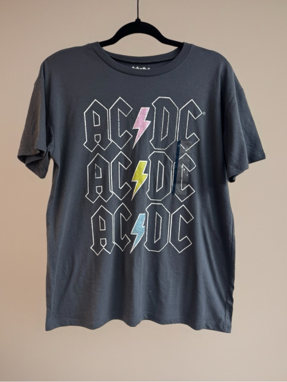 AC/DC Charcoal Tee with Pink, Yellow & Light Blue Lightning Bolts women’s Large